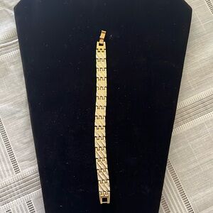 Silver and gold bracelet with excellent clasp. Gently used.